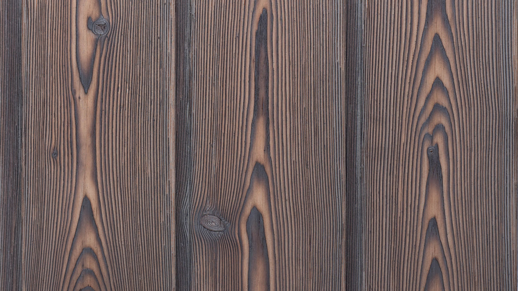 Water and fire proof charred Larch Cladding  